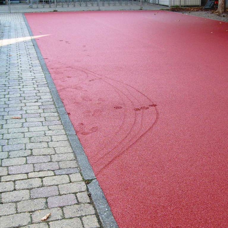 Schaden Tartanbahn Schaden Tartanbahn